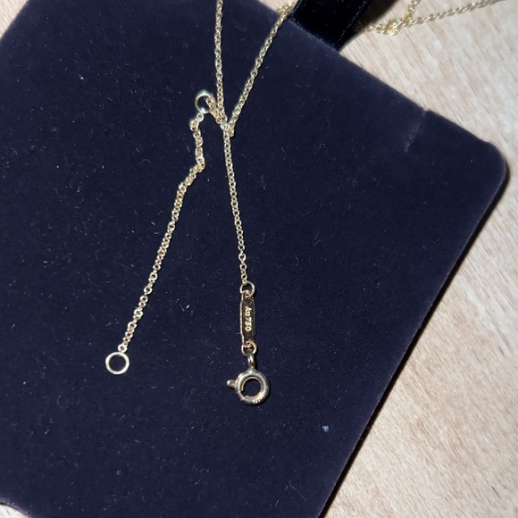 Tiffany & Co. Gold and Blue Mini Heart Pendant Necklace - Picture 17 of 17